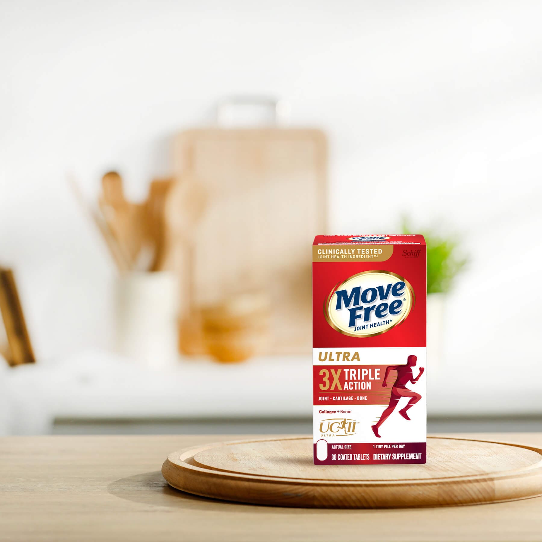 Schiff Vitamins MoveFree Ultra Triple Action on a cutting board.
